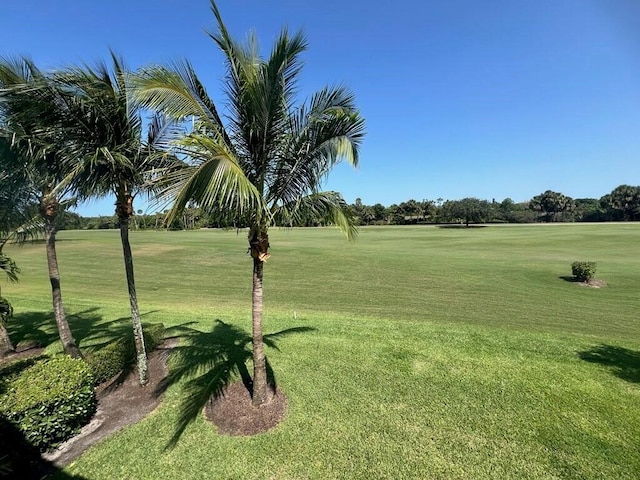 242 Tresana Blvd Unit 70, Jupiter, FL 33478 - view of property's community featuring view of golf course and a yard