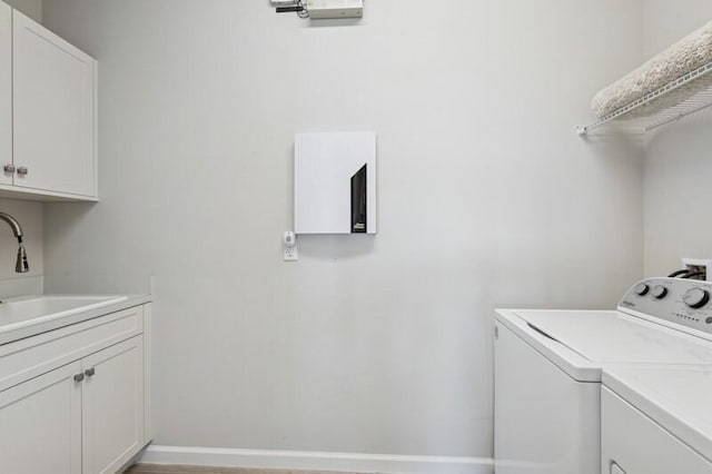 242 Tresana Blvd Unit 70, Jupiter, FL 33478 - washroom featuring independent washer and dryer and cabinet space