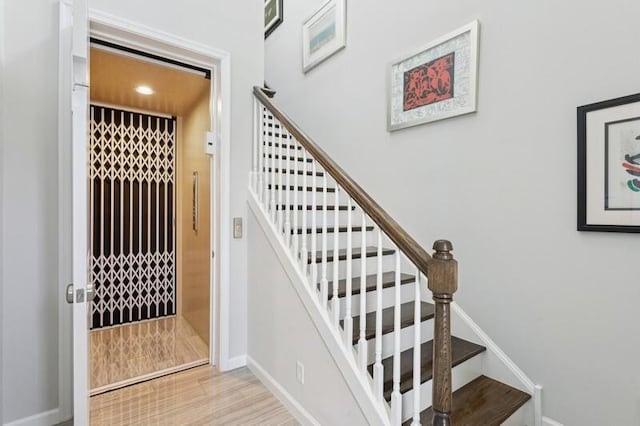 242 Tresana Blvd Unit 70, Jupiter, FL 33478 - staircase featuring baseboards