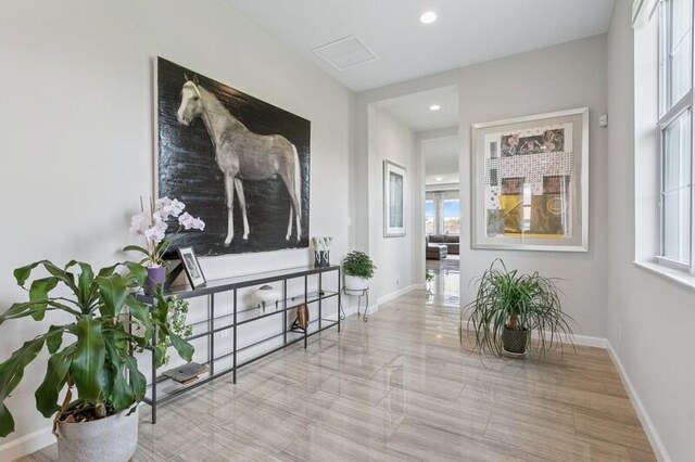 242 Tresana Blvd Unit 70, Jupiter, FL 33478 - corridor with recessed lighting and healthy amount of natural light