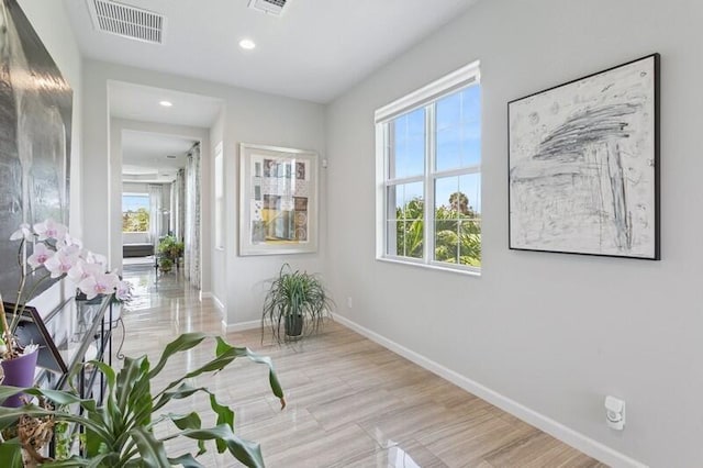 242 Tresana Blvd Unit 70, Jupiter, FL 33478 - corridor featuring baseboards and recessed lighting