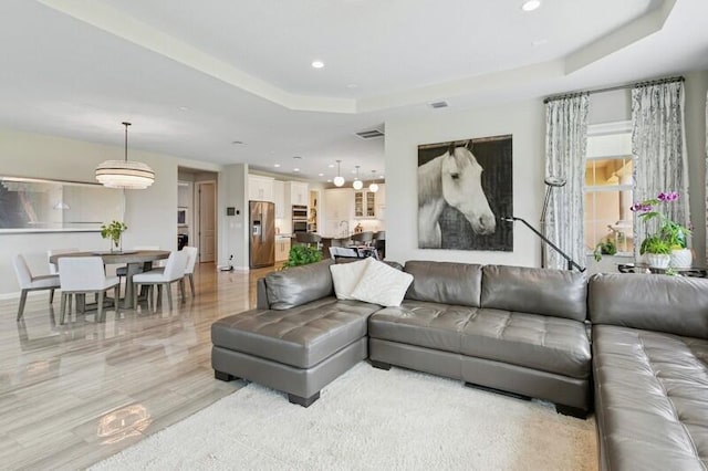 242 Tresana Blvd Unit 70, Jupiter, FL 33478 - living area featuring a raised ceiling and recessed lighting
