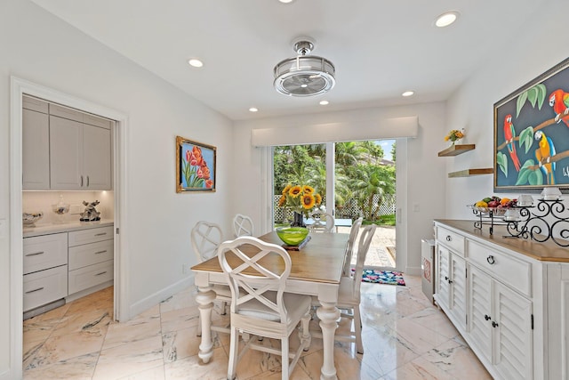 13709 Rivoli Dr, Palm Beach Gardens, FL 33410 - dining space with recessed lighting and light marble finish flooring