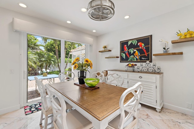 13709 Rivoli Dr, Palm Beach Gardens, FL 33410 - dining room with recessed lighting and light marble finish floors
