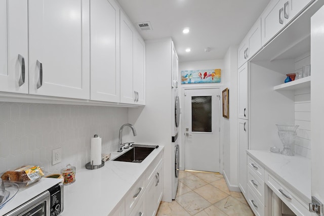 13709 Rivoli Dr, Palm Beach Gardens, FL 33410 - laundry area featuring recessed lighting