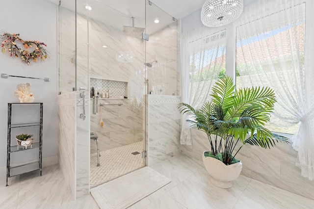 13709 Rivoli Dr, Palm Beach Gardens, FL 33410 - bathroom featuring a marble finish shower and marble finish flooring