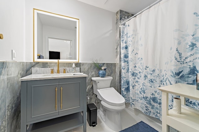 13709 Rivoli Dr, Palm Beach Gardens, FL 33410 - full bath with tile walls, vanity, wainscoting, a shower with curtain, and tile patterned floors