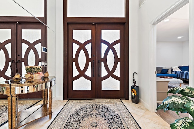 13709 Rivoli Dr, Palm Beach Gardens, FL 33410 - foyer featuring french doors and baseboards