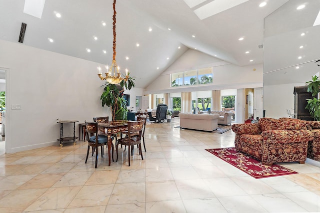13709 Rivoli Dr, Palm Beach Gardens, FL 33410 - dining space with high vaulted ceiling, a skylight, a chandelier, and recessed lighting