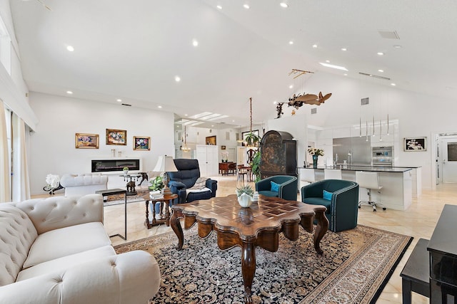13709 Rivoli Dr, Palm Beach Gardens, FL 33410 - living area featuring high vaulted ceiling and recessed lighting