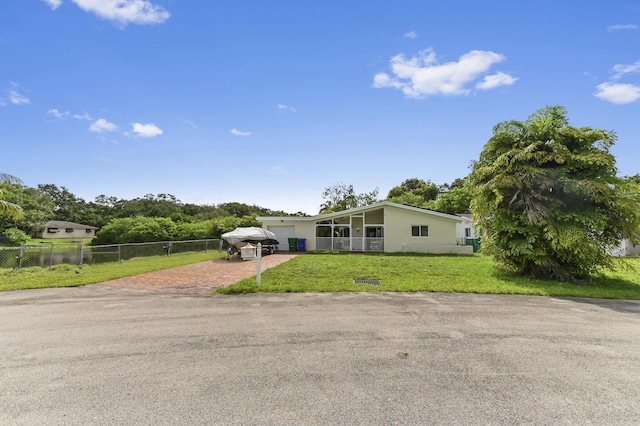 3560 SW 63rd Ave, Miramar, FL 33023 - mid-century modern home featuring decorative driveway and an attached garage