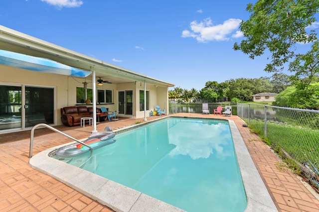 3560 SW 63rd Ave, Miramar, FL 33023 - view of swimming pool with a fenced backyard, a patio, and a ceiling fan