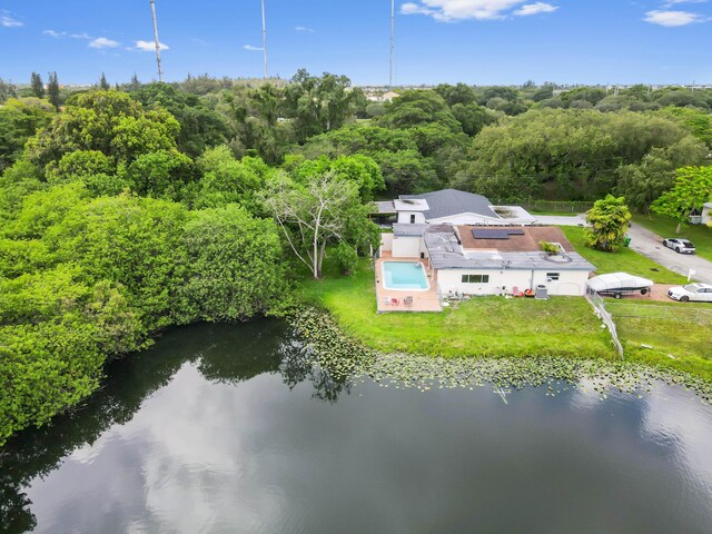 3560 SW 63rd Ave, Miramar, FL 33023 - aerial view of property and surrounding area featuring a forest and a large body of water