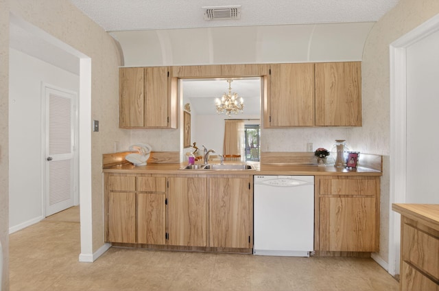 8811 SW 21st Ct Unit B, Boca Raton, FL 33433 - kitchen with dishwasher, a chandelier, and light countertops