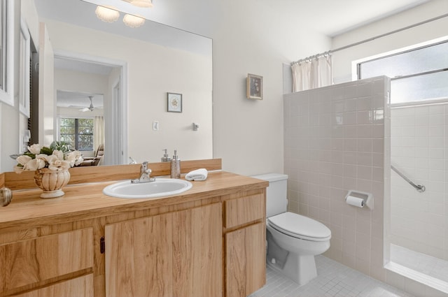 8811 SW 21st Ct Unit B, Boca Raton, FL 33433 - full bath with tiled shower, vanity, tile patterned floors, a ceiling fan, and ensuite bath