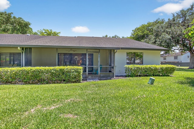 8811 SW 21st Ct Unit B, Boca Raton, FL 33433 - back of house with a lawn and stucco siding