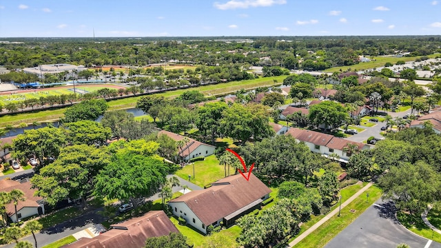 8811 SW 21st Ct Unit B, Boca Raton, FL 33433 - aerial perspective of suburban area featuring a large body of water and a tree filled landscape