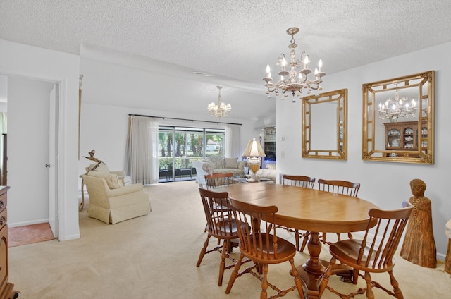 8811 SW 21st Ct Unit B, Boca Raton, FL 33433 - carpeted dining area featuring a chandelier and a textured ceiling