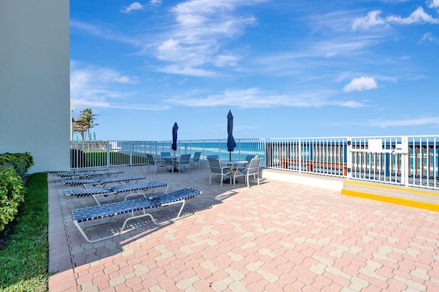 3540 S Ocean Blvd Ph 911, South Palm Beach, FL 33480 - view of patio / terrace featuring outdoor dining space and a water view