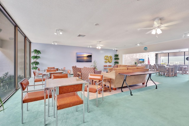 3540 S Ocean Blvd Ph 911, South Palm Beach, FL 33480 - dining room with a ceiling fan, carpet floors, and a textured ceiling