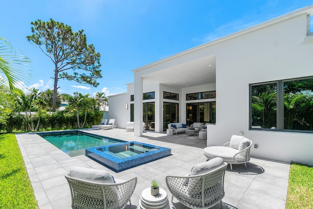17 NW 15th St, Delray Beach, FL 33444 - view of swimming pool with an outdoor hangout area, a patio, and a pool with connected hot tub