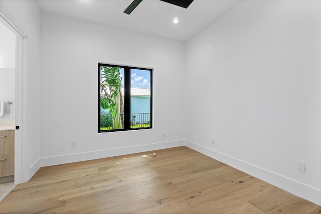 17 NW 15th St, Delray Beach, FL 33444 - spare room featuring light wood-type flooring, ceiling fan, and recessed lighting
