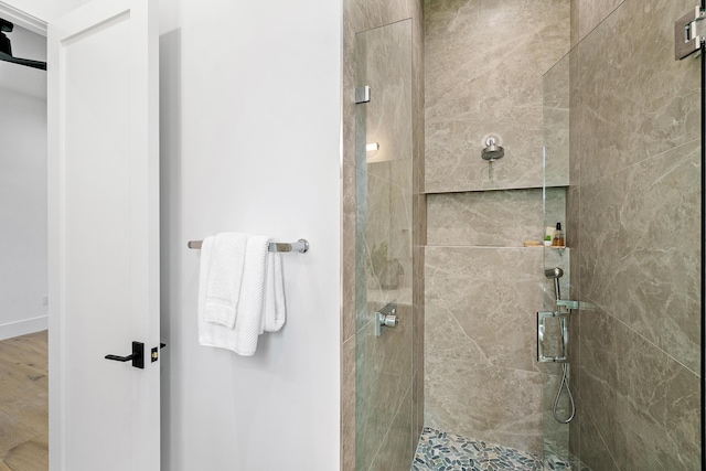 17 NW 15th St, Delray Beach, FL 33444 - bathroom featuring a shower stall and wood finished floors