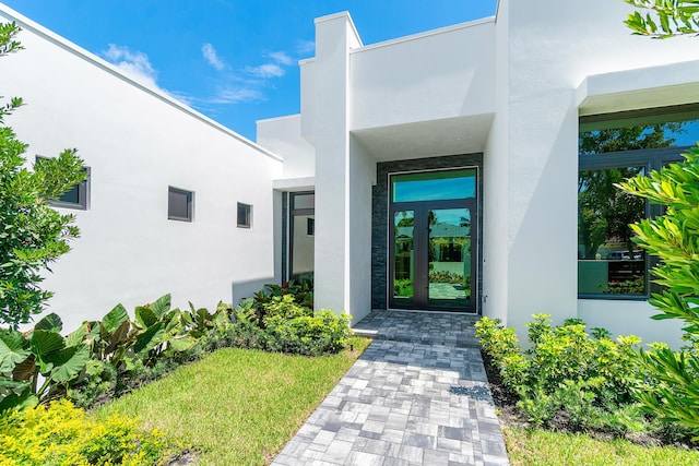 17 NW 15th St, Delray Beach, FL 33444 - doorway to property with stucco siding