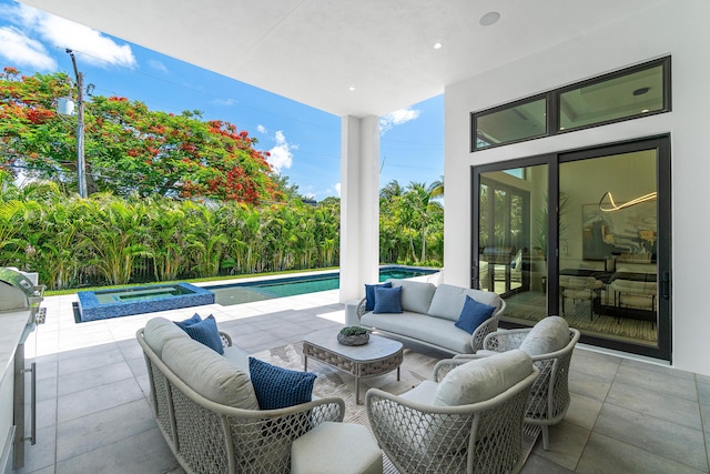 17 NW 15th St, Delray Beach, FL 33444 - view of patio featuring an outdoor living space and a pool with connected hot tub