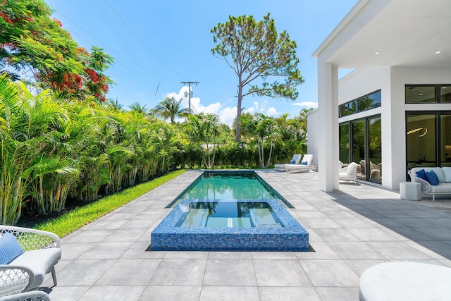 17 NW 15th St, Delray Beach, FL 33444 - view of pool with a patio area and a pool with connected hot tub