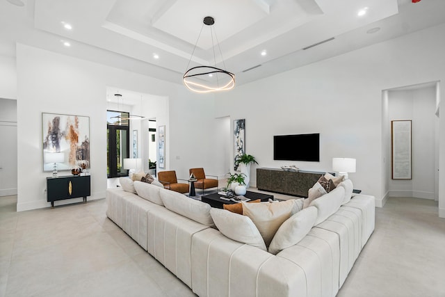 17 NW 15th St, Delray Beach, FL 33444 - living room featuring a high ceiling, recessed lighting, and a tray ceiling