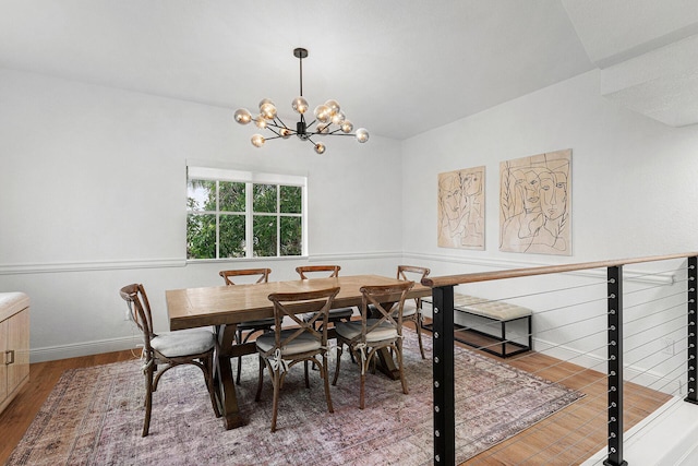 674 NW Library Commons Way, Boca Raton, FL 33432 - dining space with wood finished floors and a chandelier