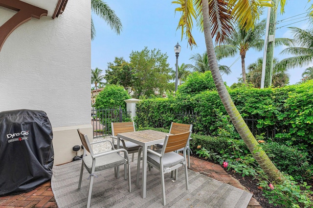 674 NW Library Commons Way, Boca Raton, FL 33432 - view of patio / terrace with outdoor dining area and grilling area