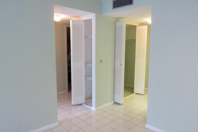 470 Executive Center Dr Unit 2K, West Palm Beach, FL 33401 - empty room featuring light tile patterned floors