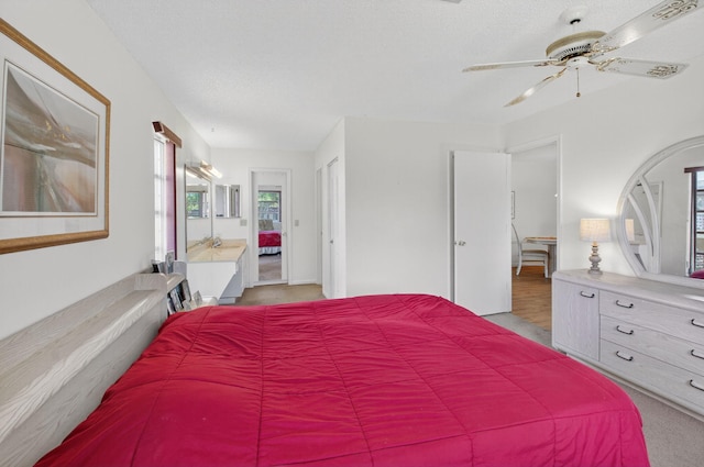 1030 Citrus Way Unit 204, Delray Beach, FL 33445 - bedroom with ceiling fan and a textured ceiling