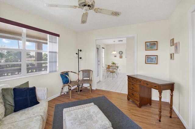 1030 Citrus Way Unit 204, Delray Beach, FL 33445 - sitting room featuring wood finished floors and a ceiling fan