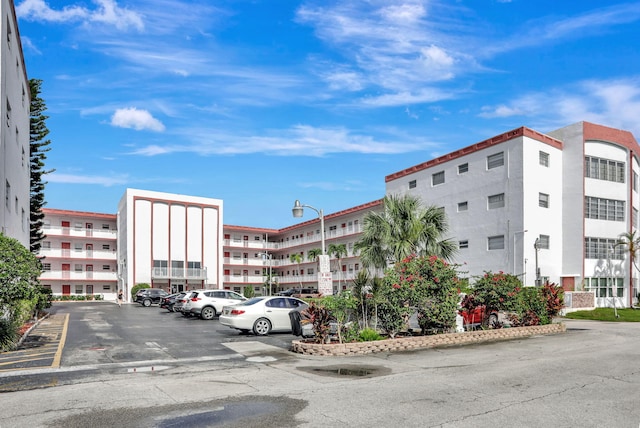 4000 NW 44th Ave Unit 113, Lauderdale Lakes, FL 33319 - view of property featuring uncovered parking