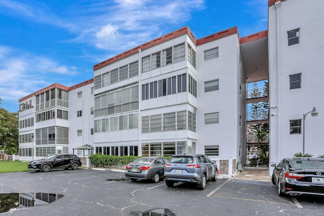 4000 NW 44th Ave Unit 113, Lauderdale Lakes, FL 33319 - view of apartment building / complex with uncovered parking