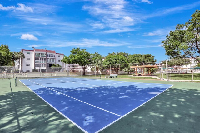 4000 NW 44th Ave Unit 113, Lauderdale Lakes, FL 33319 - view of tennis court featuring community basketball court