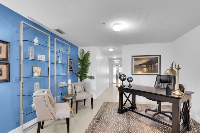 700 Ocean Royale Way Unit 202, Juno Beach, FL 33408 - office space with a textured ceiling and baseboards
