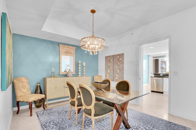 700 Ocean Royale Way Unit 202, Juno Beach, FL 33408 - dining space featuring a chandelier and baseboards
