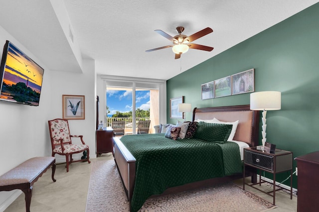 700 Ocean Royale Way Unit 202, Juno Beach, FL 33408 - bedroom with access to outside and ceiling fan