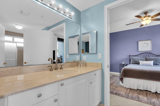 700 Ocean Royale Way Unit 202, Juno Beach, FL 33408 - bathroom featuring vanity, ceiling fan, and ensuite bathroom