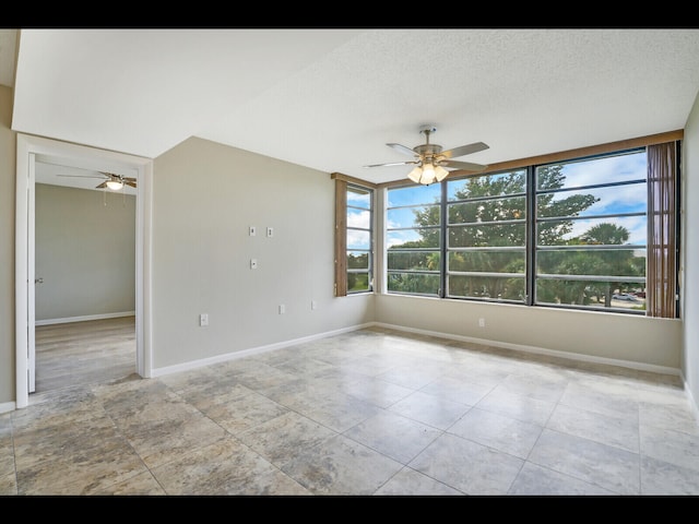 3636 Whitehall Dr Unit 401, West Palm Beach, FL 33401 - spare room featuring a ceiling fan