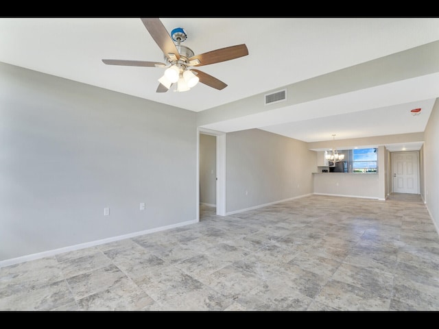 3636 Whitehall Dr Unit 401, West Palm Beach, FL 33401 - unfurnished living room featuring a chandelier and ceiling fan