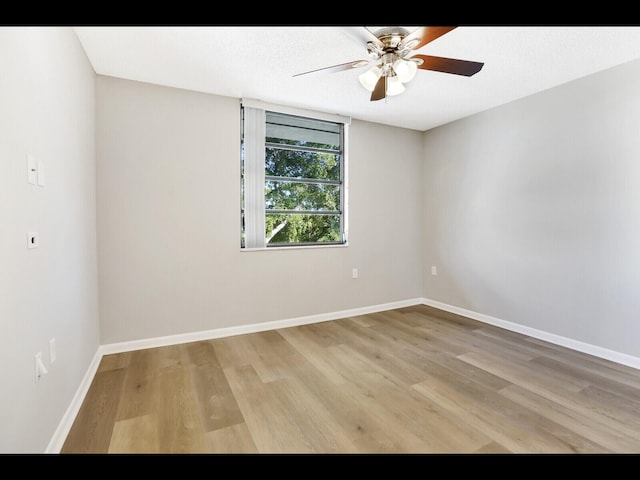 3636 Whitehall Dr Unit 401, West Palm Beach, FL 33401 - empty room featuring light wood-style floors and ceiling fan