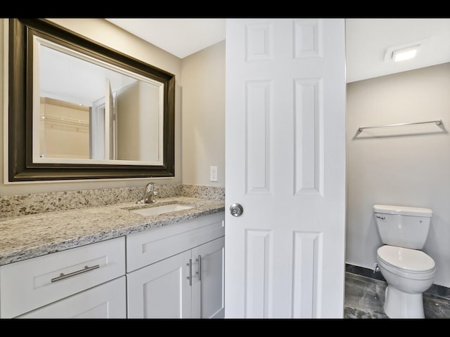 3636 Whitehall Dr Unit 401, West Palm Beach, FL 33401 - bathroom featuring vanity and marble finish flooring