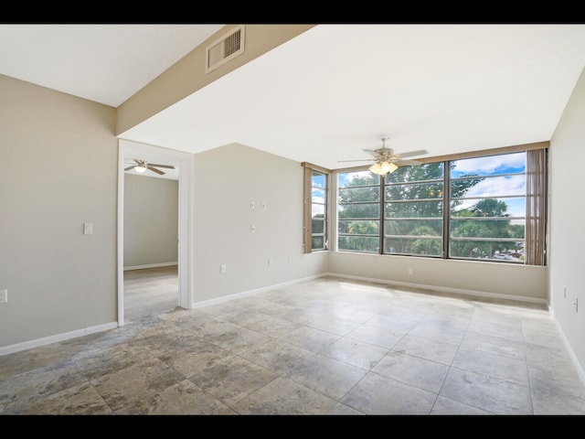 3636 Whitehall Dr Unit 401, West Palm Beach, FL 33401 - empty room featuring ceiling fan and baseboards