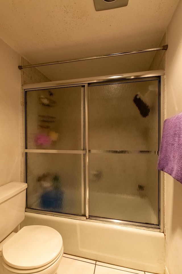 1428 SE 4th Ave Unit 127, Deerfield Beach, FL 33441 - full bathroom with combined bath / shower with glass door and tile patterned flooring