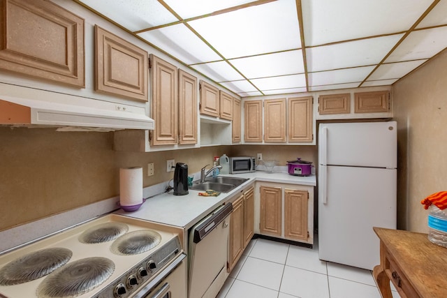 1428 SE 4th Ave Unit 127, Deerfield Beach, FL 33441 - kitchen with white appliances, light tile patterned floors, light countertops, and under cabinet range hood